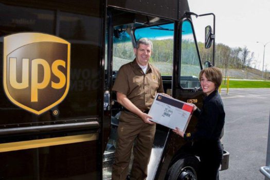 It's official; UPS is in your neighbourhood. Kim Stevenson East Atlantic Business Manager for UPS makes an Express delivery to Franchisee Owner Jennifer Wilson at The UPS Store on Wright Avenue. This is the first delivery from UPS in Halifax. (CNW Group/UPS Canada Ltd.)